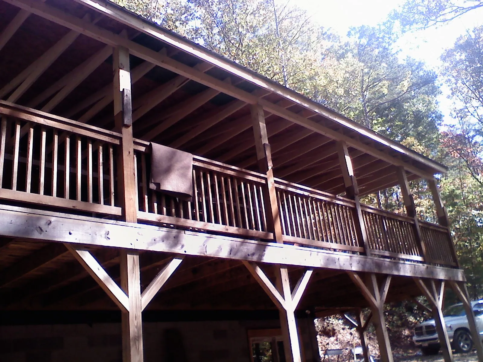 Timber framing under a new elevated porch and deck — Roof Leak Repair in South Dartmouth by Roofing Brothers
